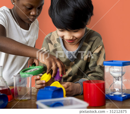 Students studying scientific experiment research Students studying scientific experiment research 31212875