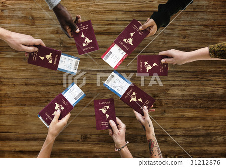 Group of Diverse Friendship Hands Show Passport with Plane Ticket Group of Diverse Friendship Hands Show Passport with Plane Ticket 31212876