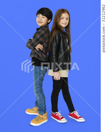 Boy and girl are posing on a shoot Boy and girl are posing on a shoot 31212962