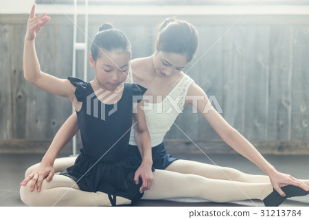 Ballet classroom instructor and student Ballet classroom instructor and student 31213784
