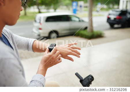 Checking heart rate Checking heart rate 31216206