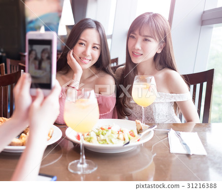 women dine in restaurant women dine in restaurant 31216388
