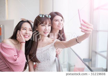 women selfie in mall 31219608