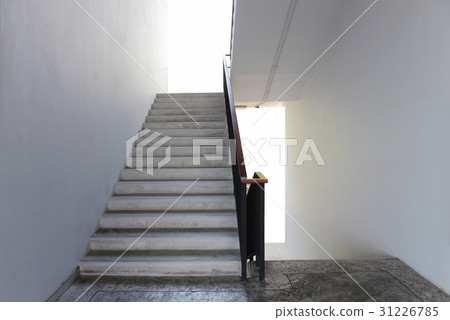 Concrete Stairs with white walls, wooden handrail Concrete Stairs with white walls, wooden handrail 31226785