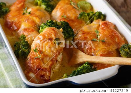 hearty Chicken fillet and broccoli baked in cheese hearty Chicken fillet and broccoli baked in cheese 31227249
