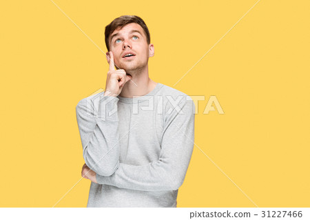 The young man smiling and looking up 31227466
