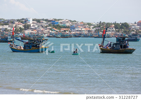 nautical fishing coracles on sea, tribal boats nautical fishing coracles on sea, tribal boats 31228727