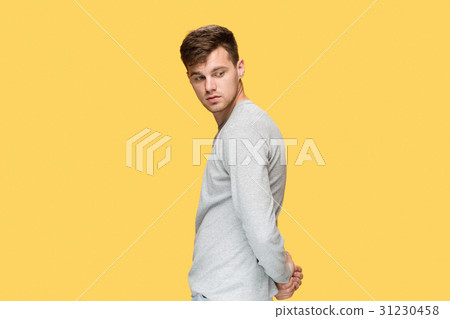 The young serious man looking cautiously 31230458