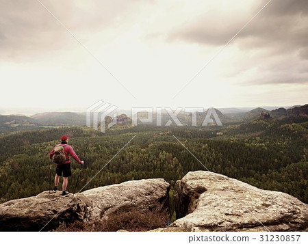 Tourist in black sportswear,backpack on view point 31230857