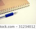 brown notebook and pen on white background vintage 31234012