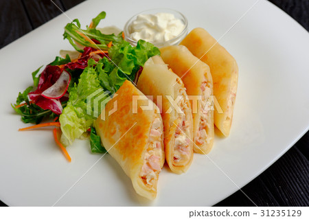 Pancakes with ham and salad Pancakes with ham and salad 31235129