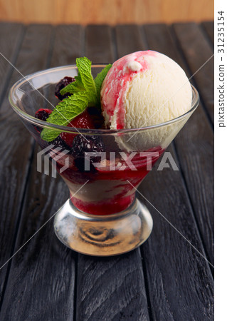 A cup of raspberries ice cream A cup of raspberries ice cream 31235154