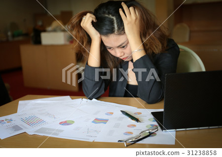 business charts paper and unhappy woman business charts paper and unhappy woman 31238858