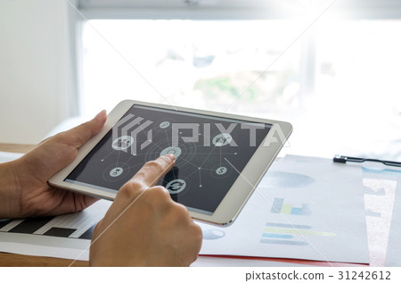 Woman hands using tablet with business connect. 31242612