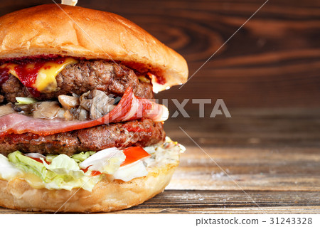 Close-up of home made tasty burgers with beef Close-up of home made tasty burgers with beef 31243328