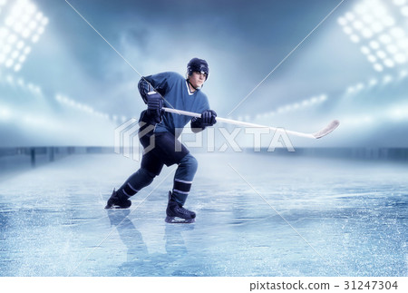 Professional ice hockey player shooting Professional ice hockey player shooting 31247304