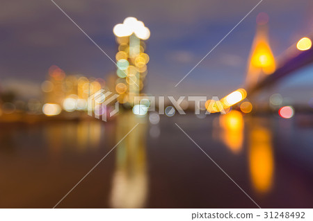 Night blurred bokeh light building and bridge 31248492