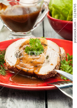 Sliced pork lion roll stuffed with mushrooms Sliced pork lion roll stuffed with mushrooms 31248705