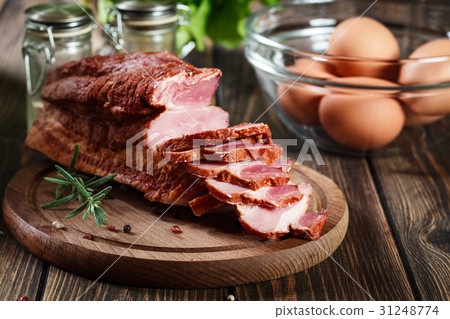 Smoked bacon with chopped slices Smoked bacon with chopped slices 31248774