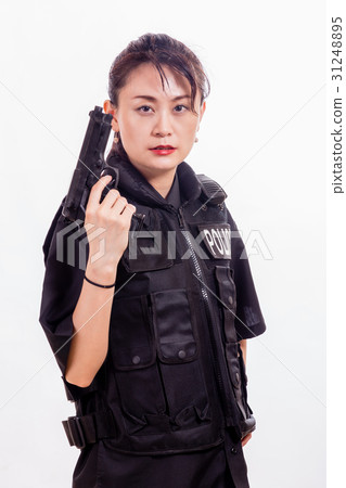 Chinese woman police officer pointing pistol 31248895