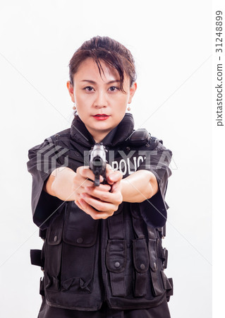 Chinese woman police officer pointing pistol 31248899