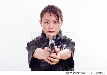 Chinese woman police officer pointing pistol 31248900