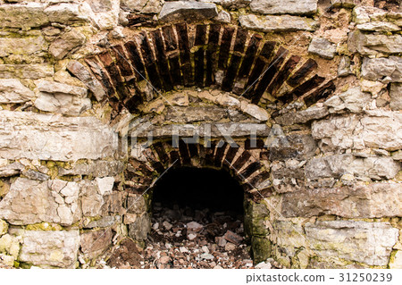 Window opening in a stone wall. Window opening in a stone wall. 31250239