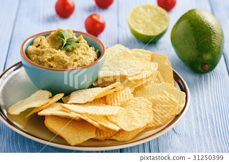 Guacamole - mexican avocado dip with tomato,lime 31250399