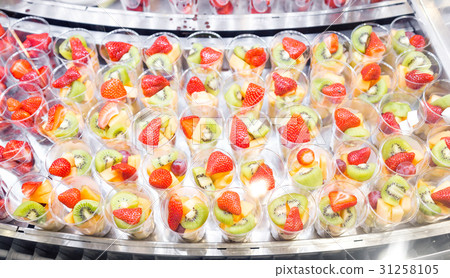Fruit salad arranged in plastic cups for sale 31258105