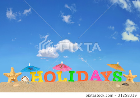 Holidays letters on a beach sand Holidays letters on a beach sand 31258319
