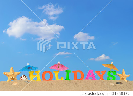 Holidays letters on a beach sand 31258322