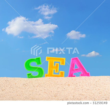 Sea letters on a beach sand 31259149