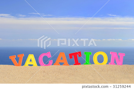 Vacation letters on a beach sand Vacation letters on a beach sand 31259244