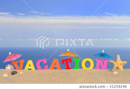 Vacation letters on a beach sand Vacation letters on a beach sand 31259246