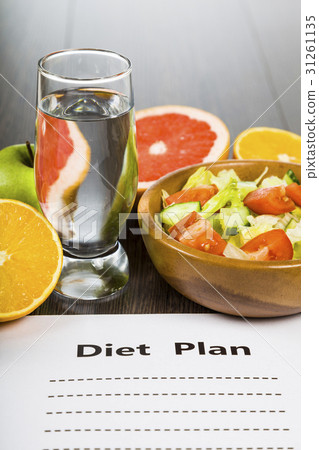 Food and sheet of paper with a diet plan Food and sheet of paper with a diet plan 31261135
