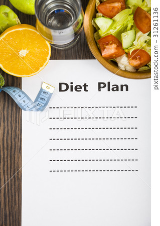 Food and sheet of paper with a diet plan  31261136
