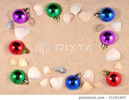 Colorful Christmas decorations and seashells Colorful Christmas decorations and seashells 31261947