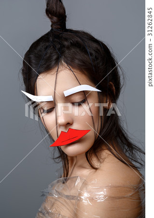 Beautiful girl with applique on face 31262845