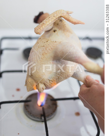 singeing chicken on fire singeing chicken on fire 31263388