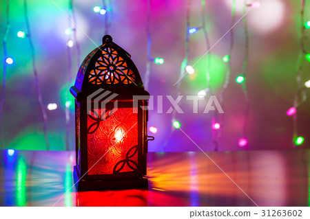 Arabic lantern in illuminated background Arabic lantern in illuminated background 31263602