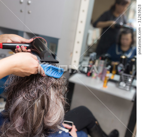 Styling female hair dryer 31263628