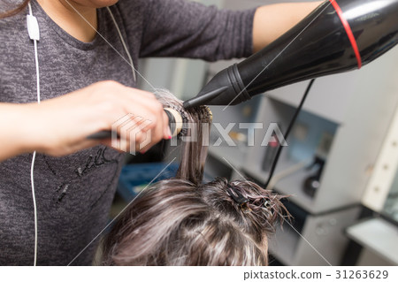 Styling female hair dryer 31263629