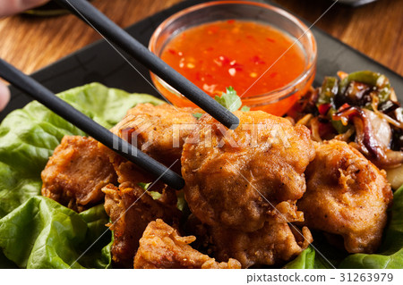 Fried chicken pieces in batter 31263979
