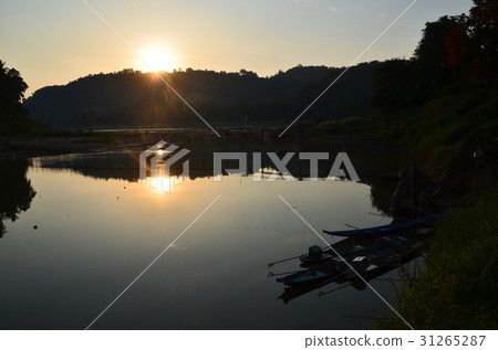 World heritage of Laos Luang Prabang at dusk Mekong River and bamboo bridge and fishing boats 31265287