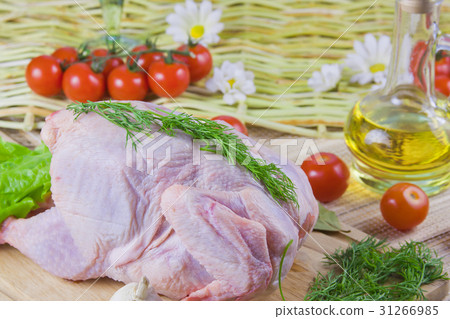 chicken carcass on a wooden board  31266985