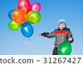 little boy with air marbles 31267427