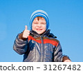 little boy  on a background sky 31267482