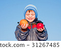 little boy with  fruit in hands 31267485