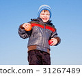 little boy with  fruit in hands 31267489