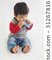 Baby playing on mobile phone 31267816